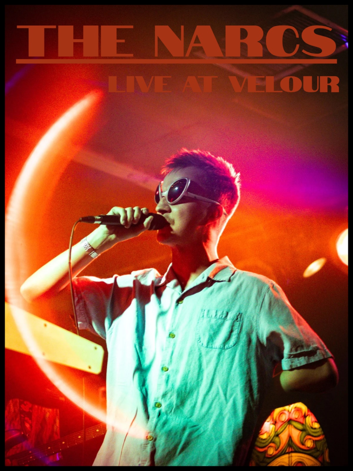 The Narcs poster: singer in white sunglasses inside a ring of light, Live at Velour